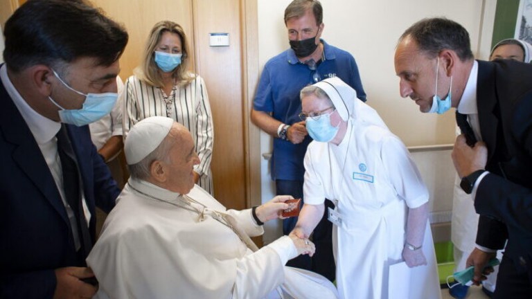 Pope Francis speaks with a nun at the Gemelli hospital, as he recovers following scheduled surgery on his colon, in Rome, Italy, July 11, 2021.  Vatican Media/­Handout via REUTERS    ATTENTION EDITORS &#8211; THIS IMAGE WAS PROVIDED BY A THIRD PARTY.